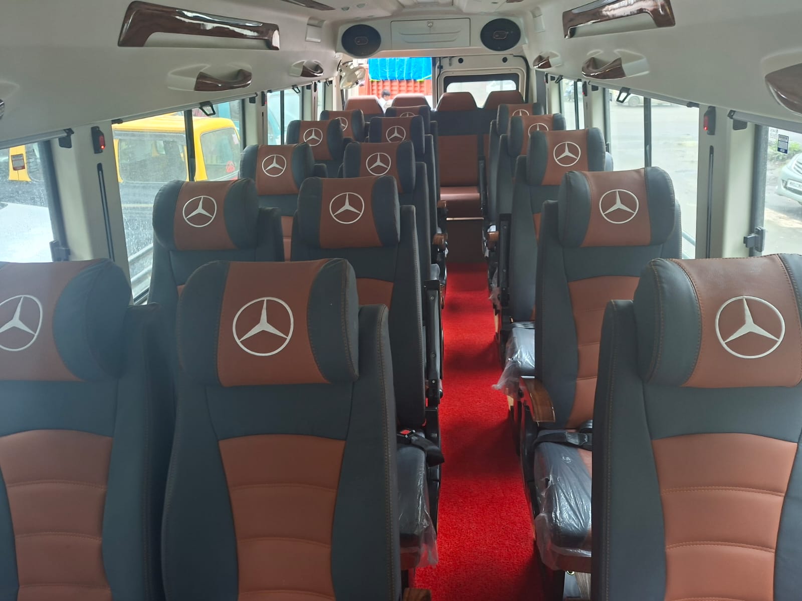 Seating inside a Nishnai tempo traveller