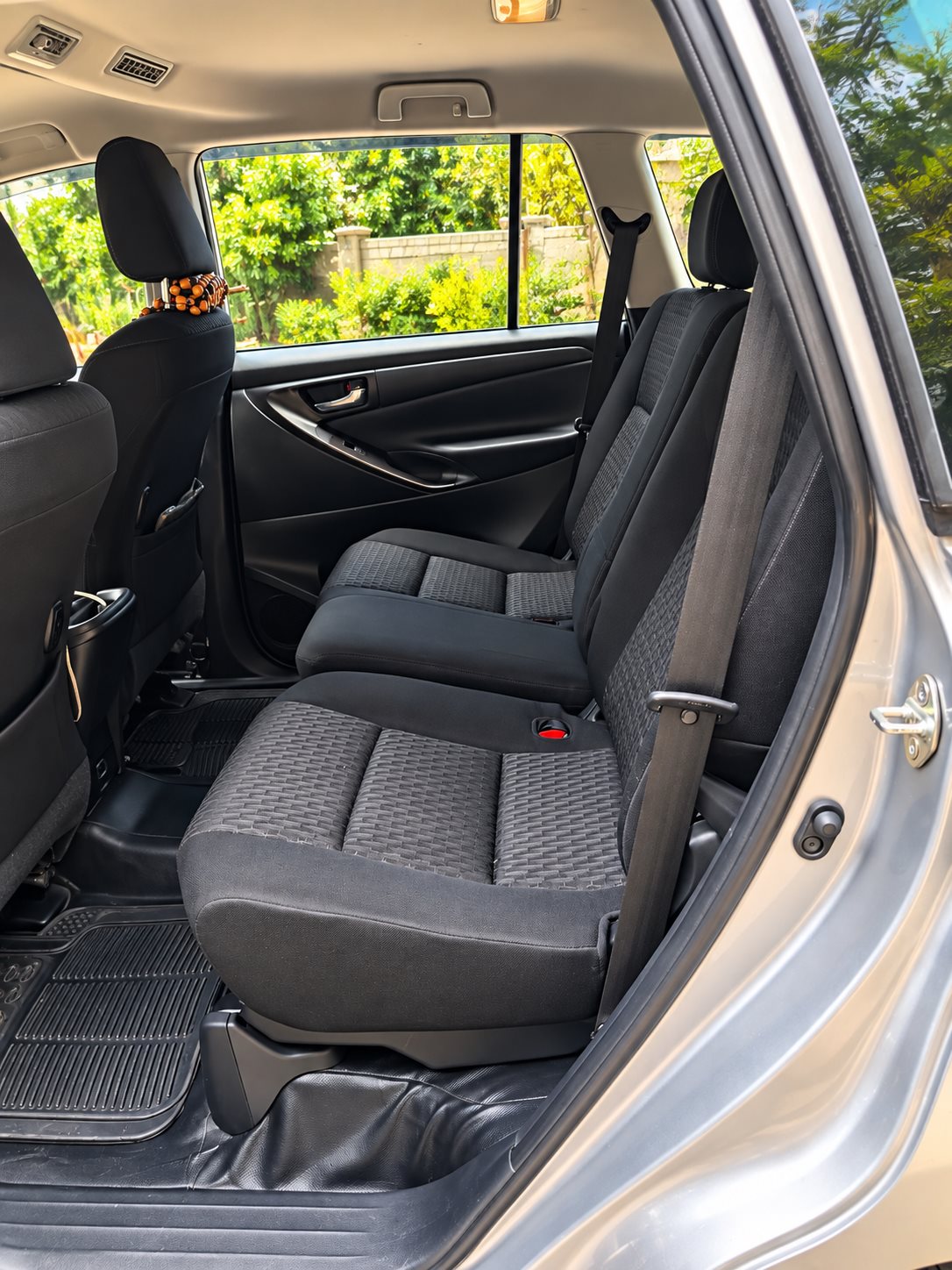 Rear seating inside a Nishnai Innova Crysta
